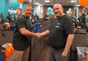 Best Egg employees shaking hands.