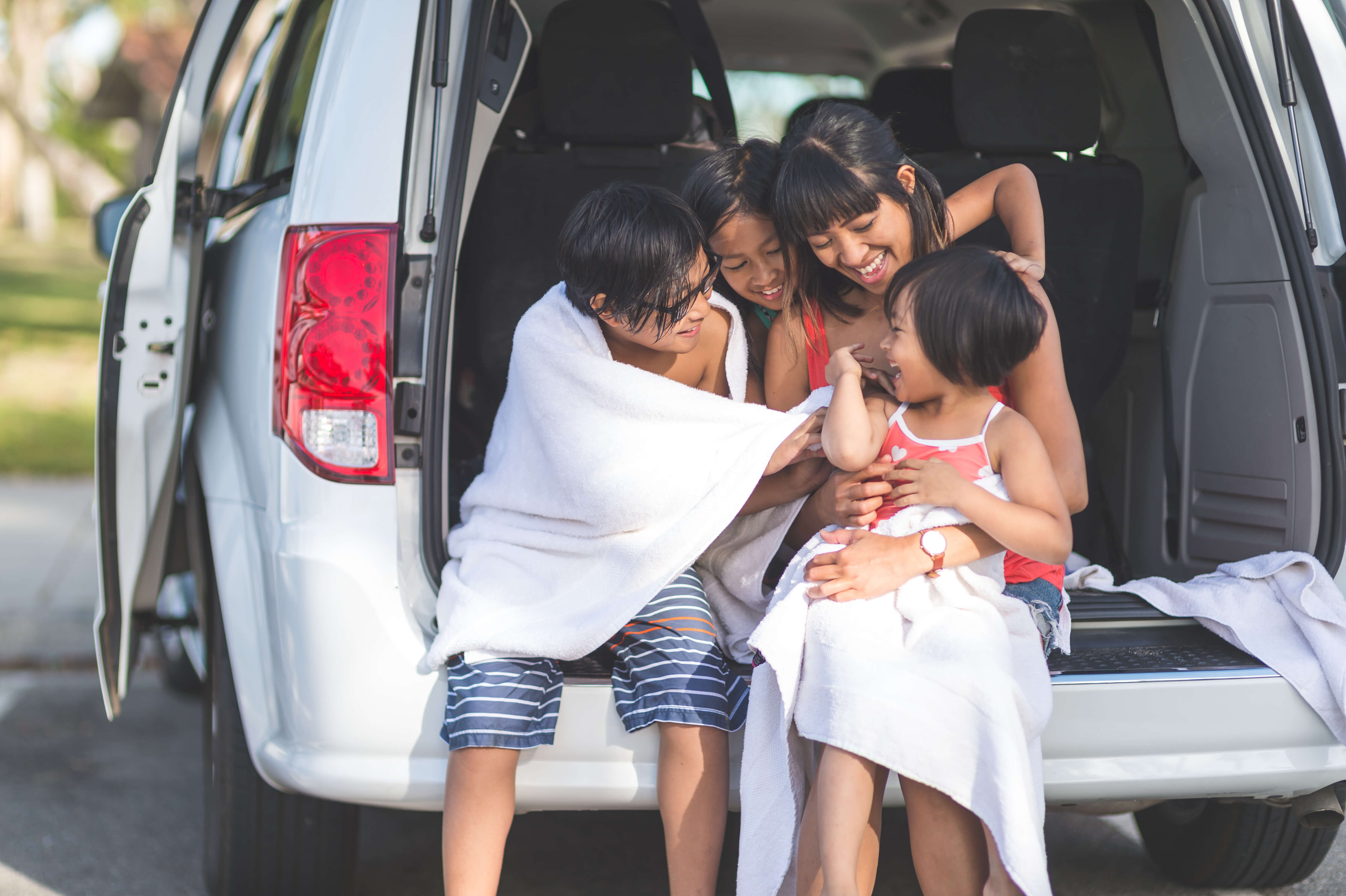 Woman and Children Enjoying Car