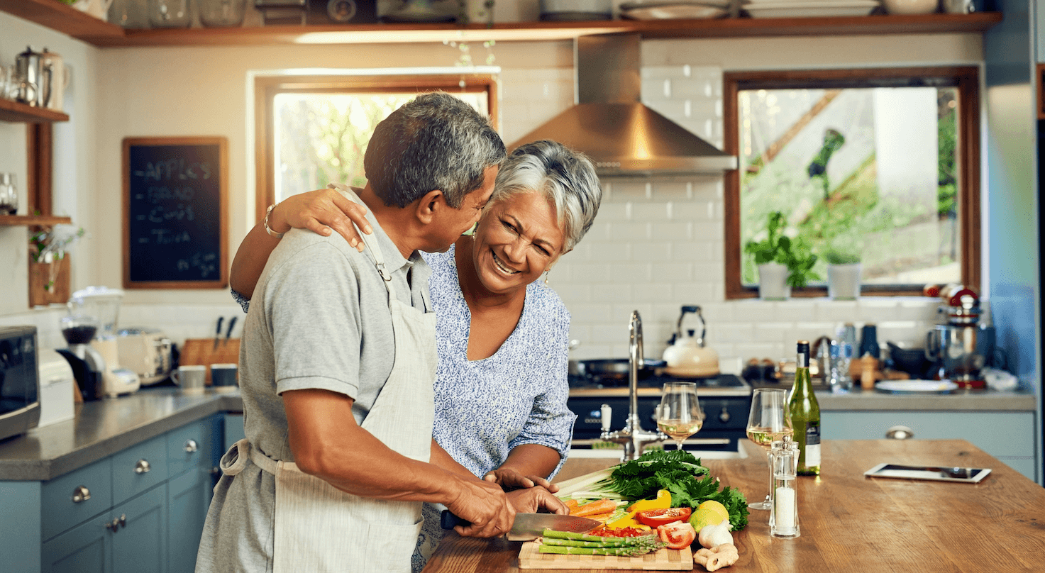 couple celebrating after home renovation