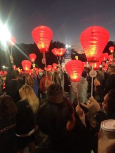 Staff releasing lanterns into the sky.
