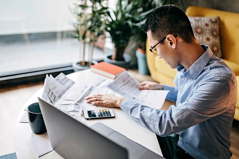 man learning about the difference between good and bad debt