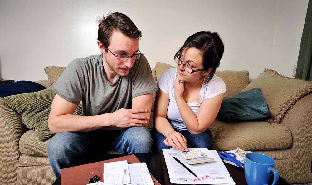 couple planning how to handle their bills in an emergency