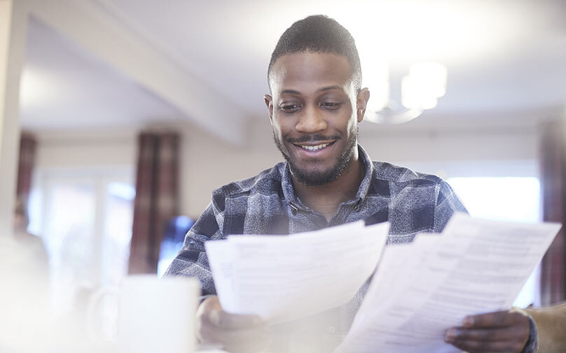 man learning what a debt consolidation loan is.