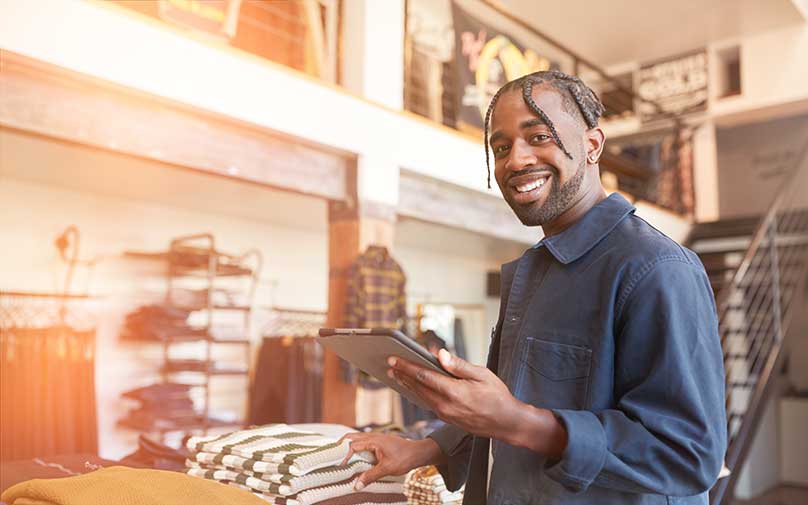 Man smiling after learning about small personal loans