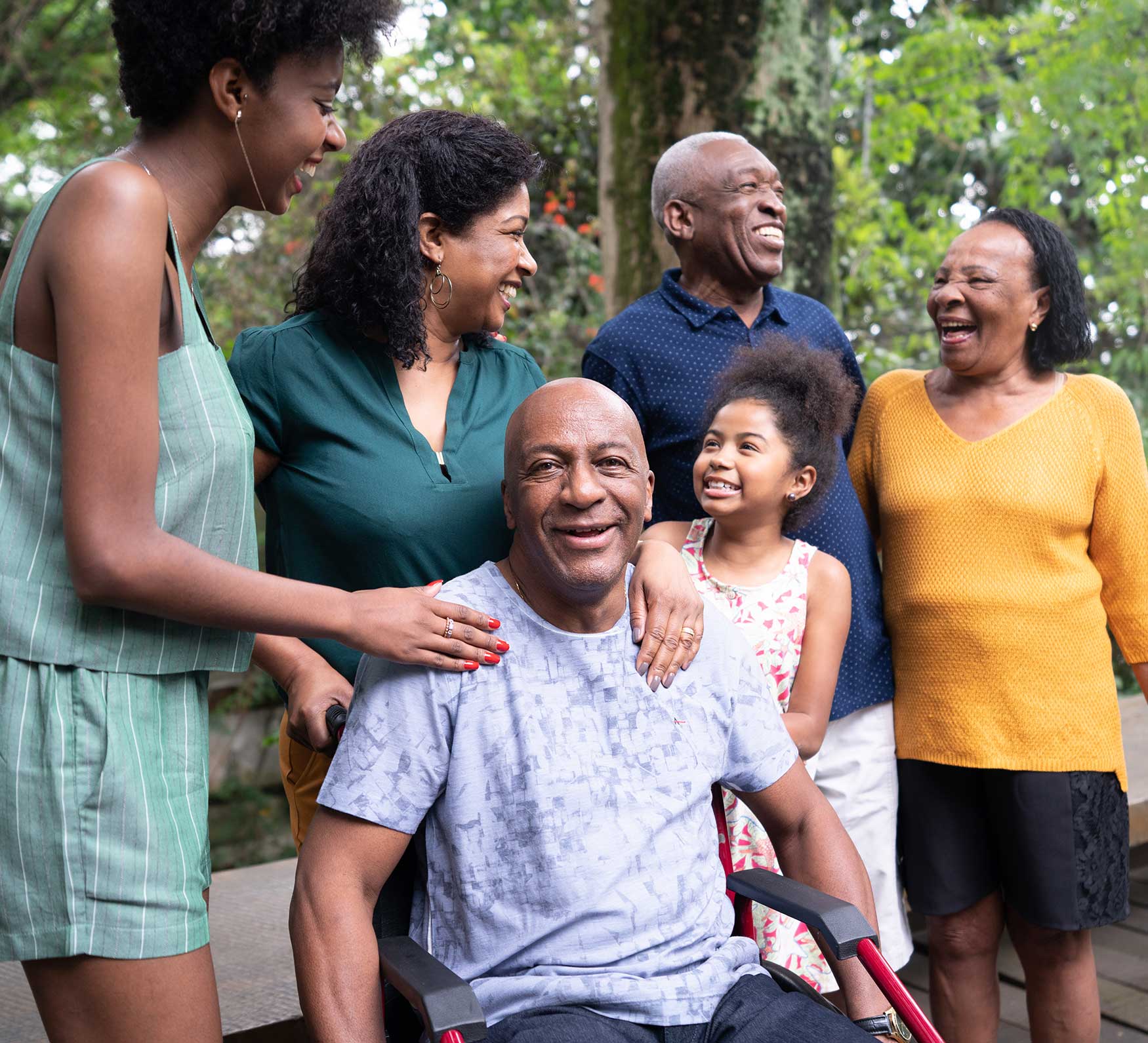 family smiling and laughing for a picture