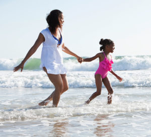 Mother and daughter at beach