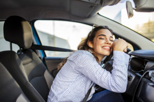 woman learning if a car loan will raise her credit score