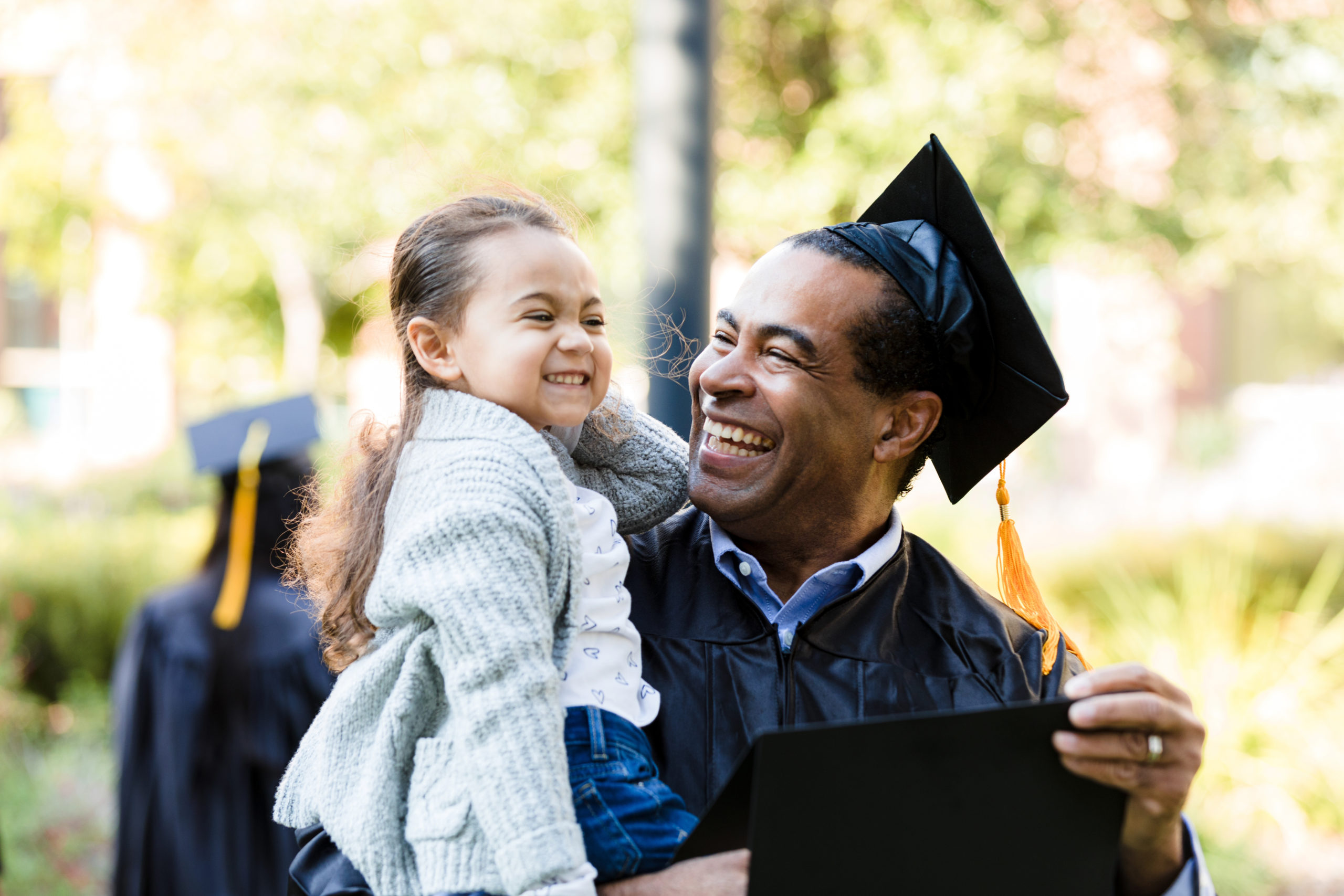 man excited after learning about help for student loans