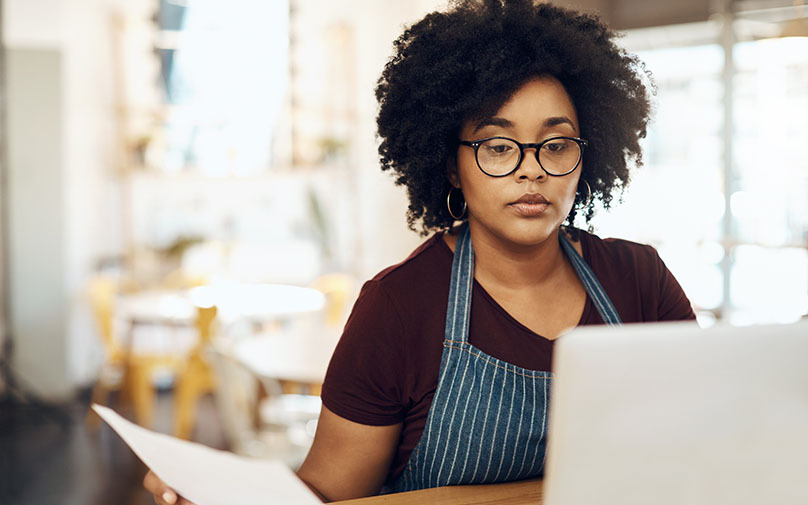 woman tracking her expenses