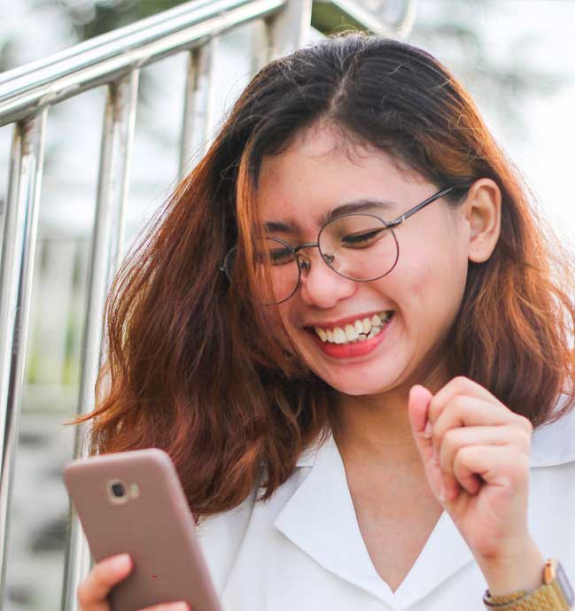 Happy lady with smartphone