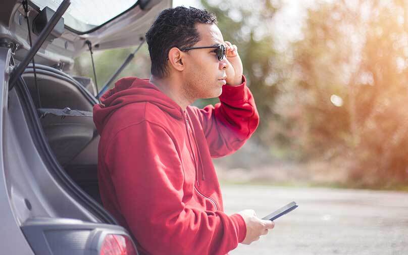 man learning if refinancing a car will hurt his credit