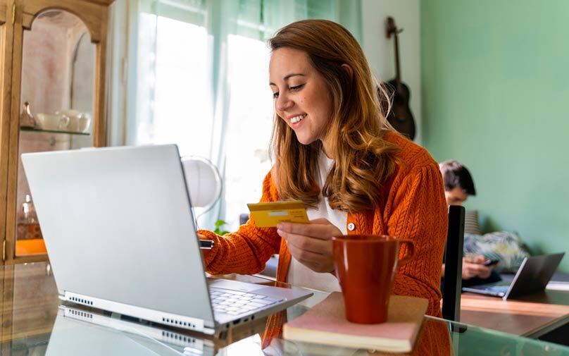 woman learning how to protect herself from credit card fraud.