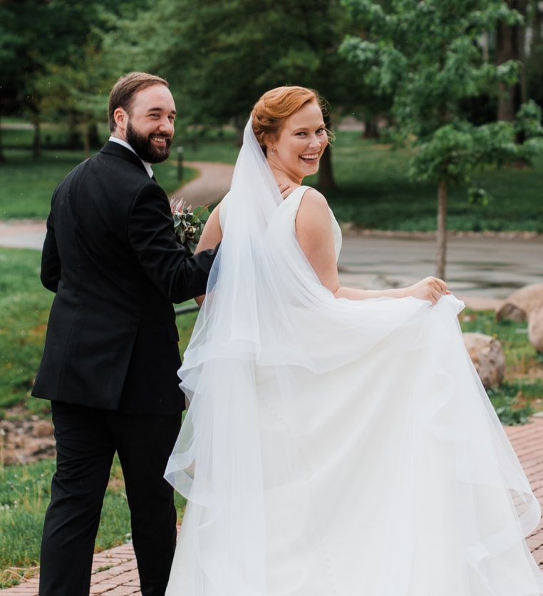 Just married couple looking back and smiling