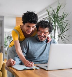 Couple working on laptop