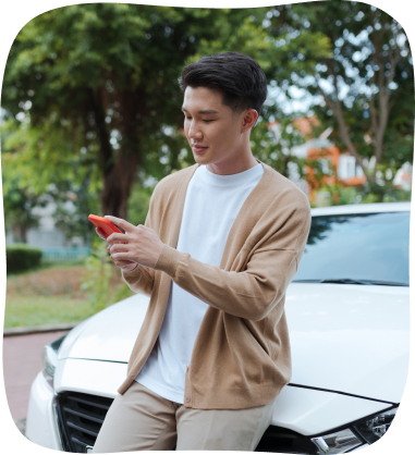 guy on car on phone