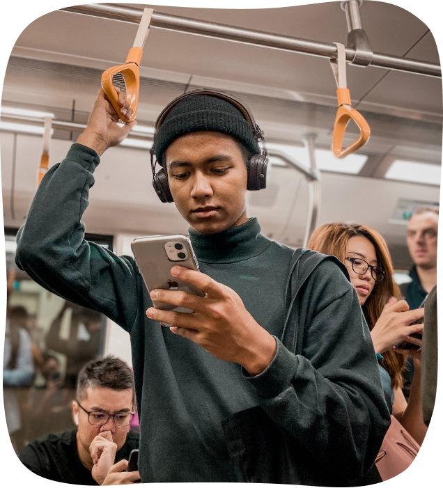 Person on phone on train