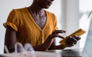 Woman on yellow phone