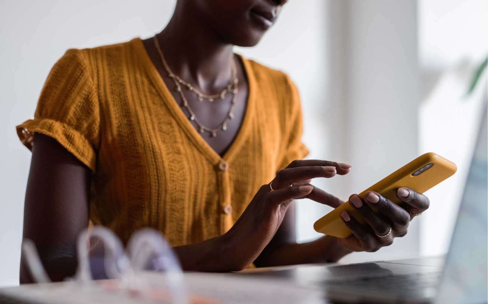Woman on yellow phone