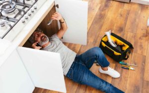 Man fixing sink