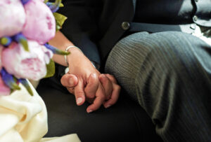 A couple holding hands